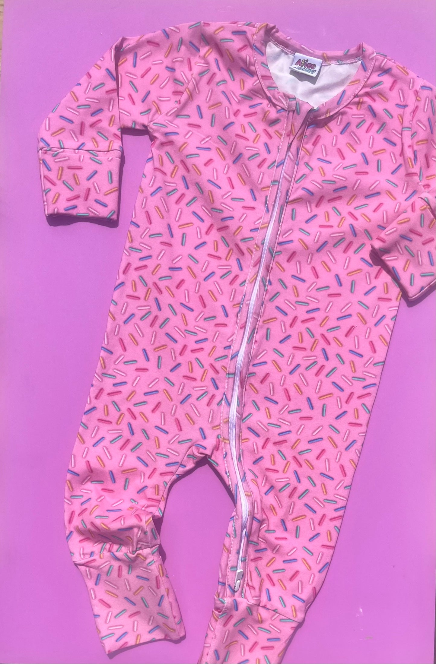 Ready To Post Pink Sprinkle Standard Jersey Zipped Sleepsuit