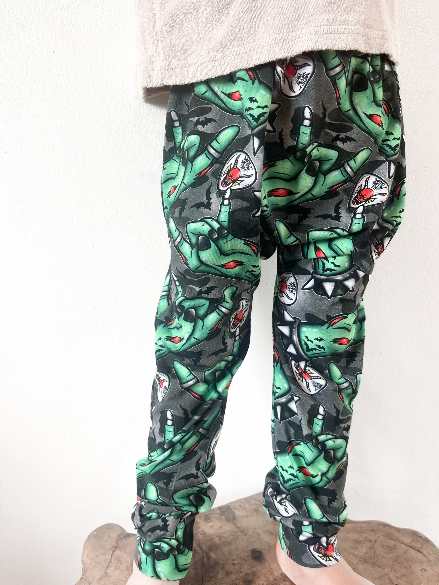Kids harem pants with zombie rock hand print and metal-inspired design