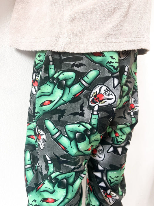 Kids harem pants with zombie rock hand print and metal-inspired design
