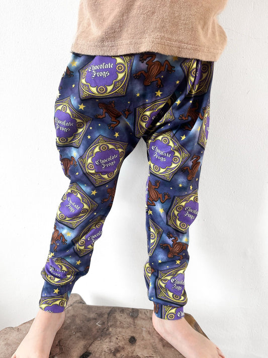 Kids harem pants with magical chocolate frog print and starry background